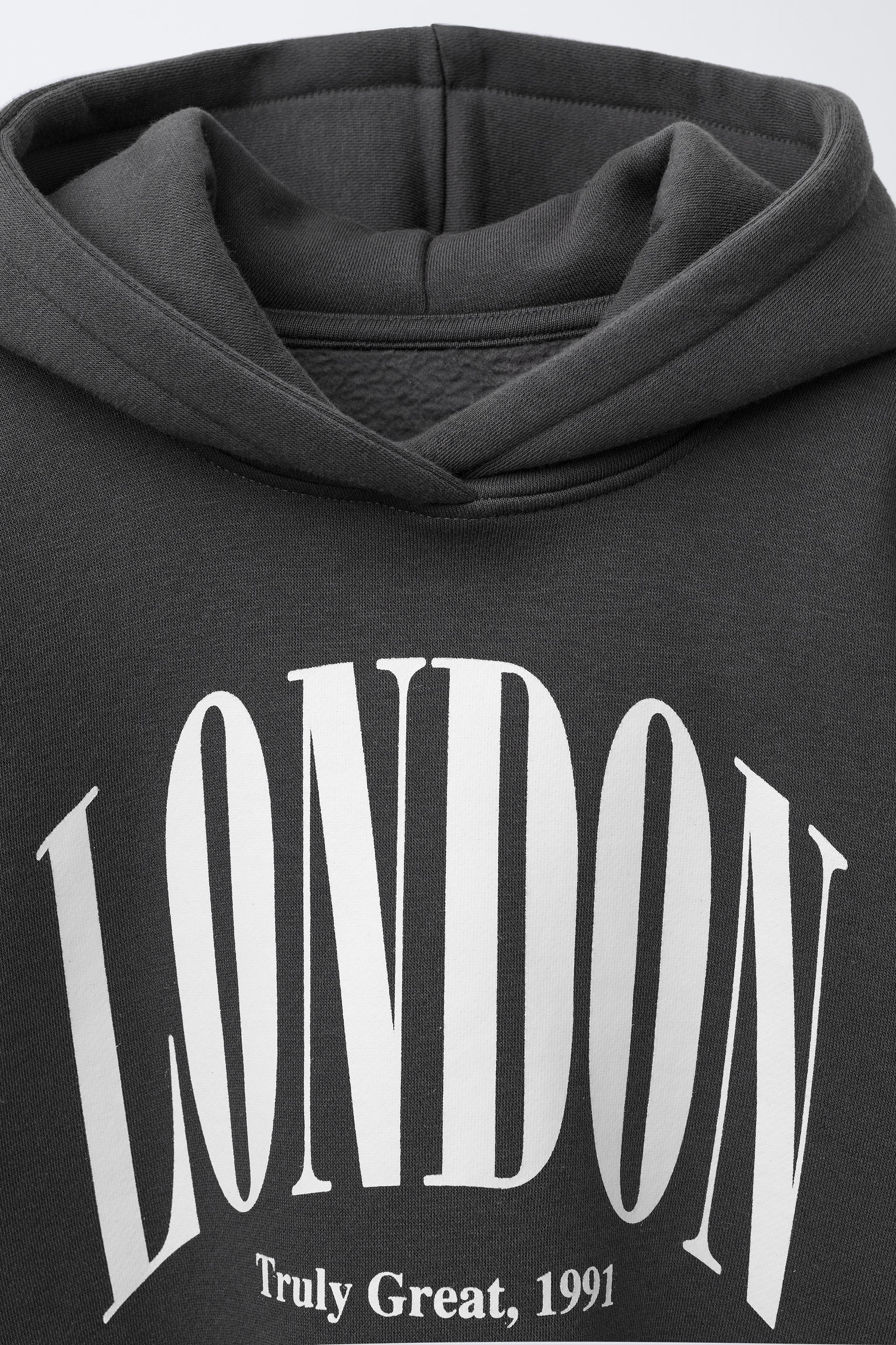 VARSITY DOUBLE HEM HOODED SWEATSHIRT